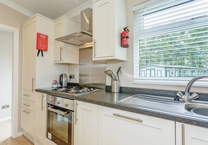 New in 2017. Modern and contemporary 14ft-wide lodge style holiday home.
