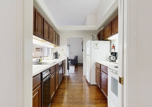 Newly-furnished condo with loft, fast WiFi, partial AC, grills & yard access