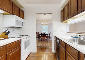Newly-furnished condo with loft, fast WiFi, partial AC, grills & yard access
