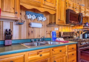Niboban Cabin 5 right on Rangeley Lake with a screened porch, fire pit, hammock, WiFi and dock!