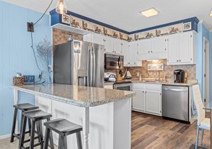 Ocean-view condo with beach access, WiFi, pool, washer/dryer, & AC