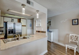 Oceanfront Point Unit, with wine fridge, steps to the beach