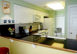 Pearl 406 What a view! Sugar White Sand & Emerald Waters! Wrap Around Balcony!