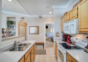 Pristine Top Floor Condo With Access To Clubhouse & Pools