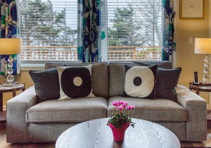 Remodeled Waterfront Duplex with a Deck, Ocean Views, and Easy Access to Town