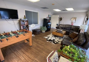 Rent a private room in a hostel type building with 1 queen bed for 2 adults.