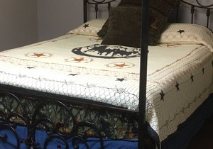 Rent a private room in a hostel type building with 1 queen bed for 2 adults.