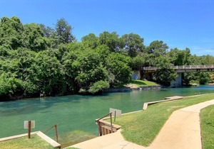 Right on the Comal and across from Schlitterbahn! Pool and river access!