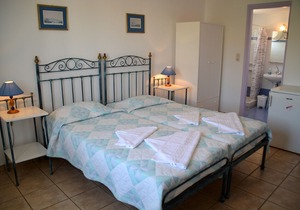 Room with two beds and panoramic seaview