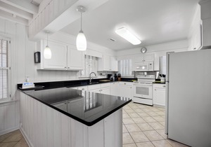 Second row beach house, screened porch with rocking chairs, easy walk to beach