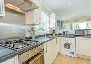 Shepherd’s Hut with an open plan design with king-size bed.