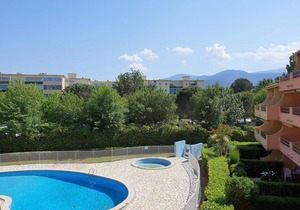 Spacious 2-BR Apartment, Pool View, 300m from Beach, A/C, Parking, Balcony, Elevator Access
