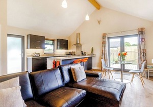 Stylish and luxurious open plan lodge with underfloor heating and smart TV.