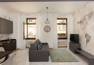 Stylish Apartment "RivApartmentsDowntowN - Travel" with a View of the Old Town of Riva del Garda, A/C & Wi-Fi