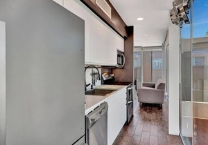 This fully updated, three-story contemporary townhome is the perfect spot for business or a getaway