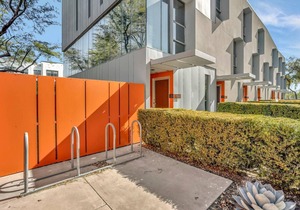 This fully updated, three-story contemporary townhome is the perfect spot for business or a getaway