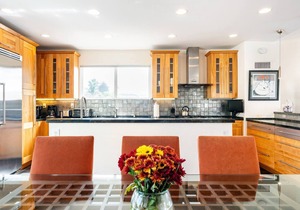 This modern architectural mansion overlooks the historic Venice Canals.