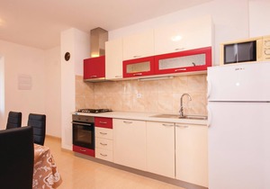 This simply and functionally furnished apartment is located in the small village of Bilice and is on