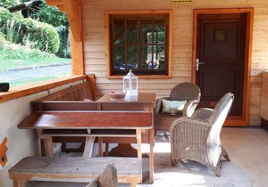 Tidy chalet with fireplace, located in wooded area