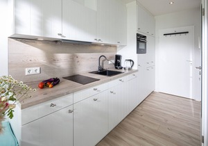 Top sea view, one-room apartment, modern, directly on the beach with sauna and WLAN