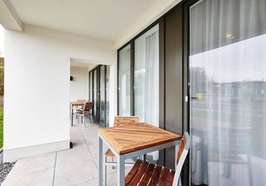 Vacation apartment close to the beach with large terrace incl. use of swimming pool & sauna