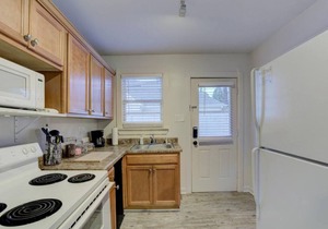 Walk to your Own Gated Retreat from Midtown`s Best