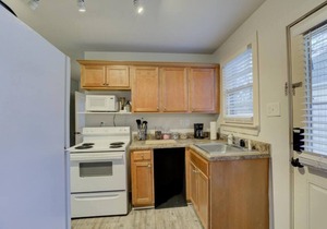 Walk to your Own Gated Retreat from Midtown`s Best