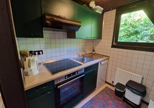 Wooden bungalow with a terrace, in a wooded area