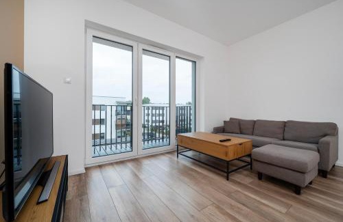 Lodz Apartment | Świętojańska Harmony Apartment by BookingHost