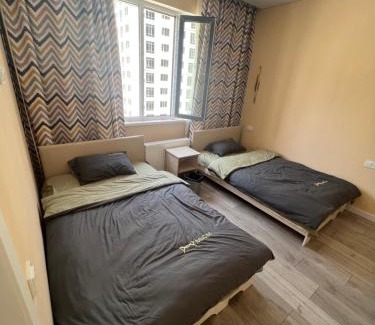 Almaty Apartment | Оранжевая семья橙子民宿