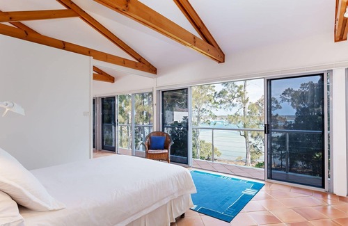 Corlette House | 1/44 Danalene Pde - fantastic waterfront property with air con