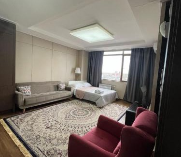 Almaty District Apartment | 12эт 2х на 6 гостей возле посольства США с 2мя кроватями, диваном и 2мя санузлами в Хайвилле