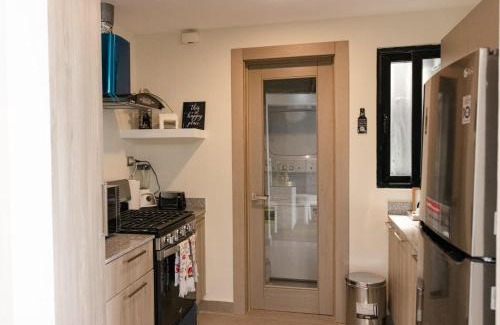 Santo Domingo House | 1br Luxury Condo Jacuzzi, gym Mountains with parking lot