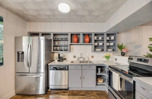 Old East Dallas Condo | 2-level luxury loft with pool, private patio, and historic charm.
