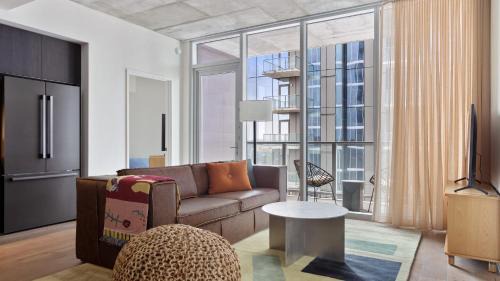 Rainey Street Historic District House | 3 Condos Brand New Austin High Rise w Rooftop Pool Gym Yoga Studio More