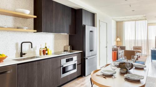 Rainey Street Historic District House | 3 Condos Brand New Austin High Rise w Rooftop Pool Gym Yoga Studio More