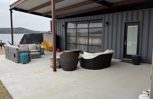 Graford House | 3B/3B Lake front property with dock, hot tub, and entertainment area outside!