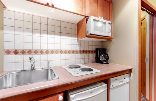 Village North Apartment | 3rd-floor studio with hot tubs, a pool, saunas, & fitness room