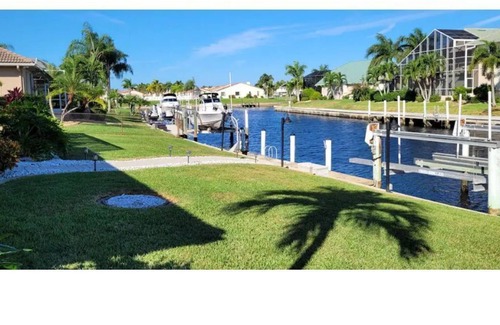 Meridian House | 3RD X A Charm, Home on Canal with Sailboat water.