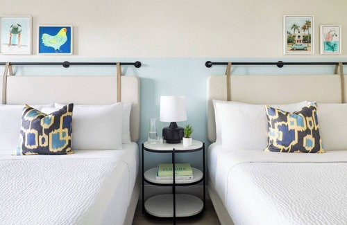 New Town Hotel | 4 Pool-view Rooms with 2 Queen Beds l Island Vibes Await in Blue Flamingo Resort