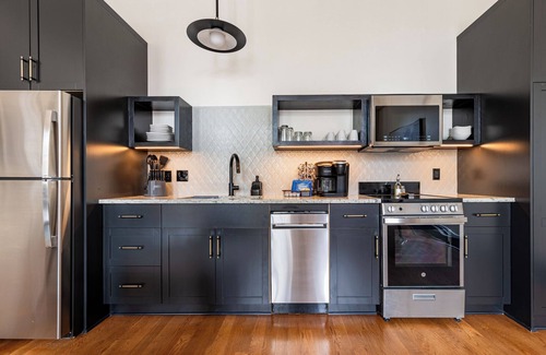 Central Business District Hotel | 4BR Rare Group Space + Private Patio on Canal St | The Mayfair