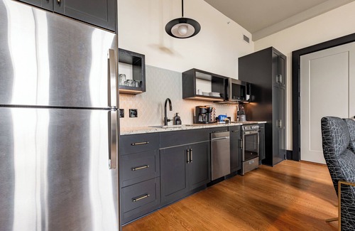 Central Business District Hotel | 4BR Rare Group Space + Private Patio on Canal St | The Mayfair
