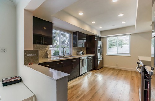 Imperial Point House | 5 min to beach/Lux modern home/Exceptional outdoor area/pool/games
