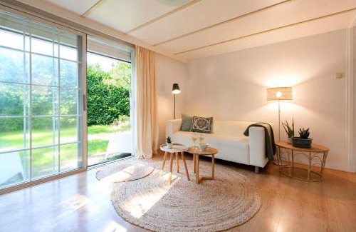 Oisterwijk Ski Chalet | 84, gelegen in het rustige & bosrijke Oisterwijk! Met privétuin