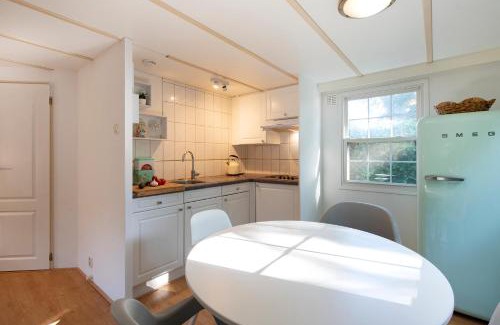 Oisterwijk Ski Chalet | 84, gelegen in het rustige & bosrijke Oisterwijk! Met privétuin
