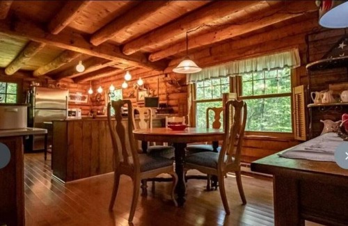 Kerhonkson House | A modern "State of the Art" Log Cabin nestled in a serene wooded property.