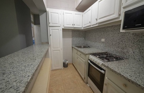 ProCab Apartment | A short walk to shop and beach, lovely Ground-floor condo with pool