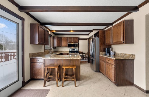 Grand Blanc House | Acorn House - 3 bedroom home with an inground pool, hot tub and a gas fireplace!