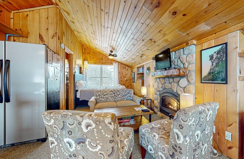 Gilford Cottage | Adorable cottage with a full kitchen, gas fireplace, pool, koi pond, & gazebo