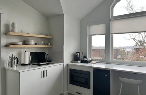 Norkirk Apartment | ADU at 126 · Vaulted ceiling ADU studio apartment killer views